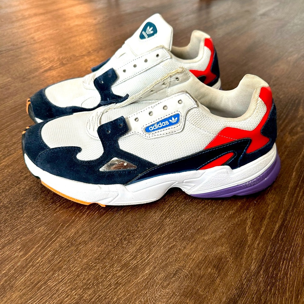 Reg $175- going for $20. Normal use and wear. No shoe laces. Multi-colored.